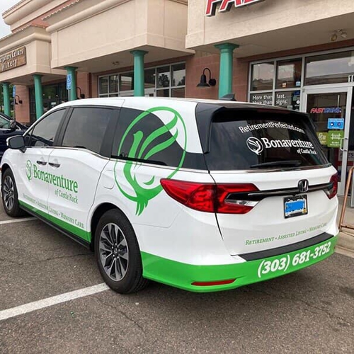 Bonaventure Vehicle  parked outside the fast sign building